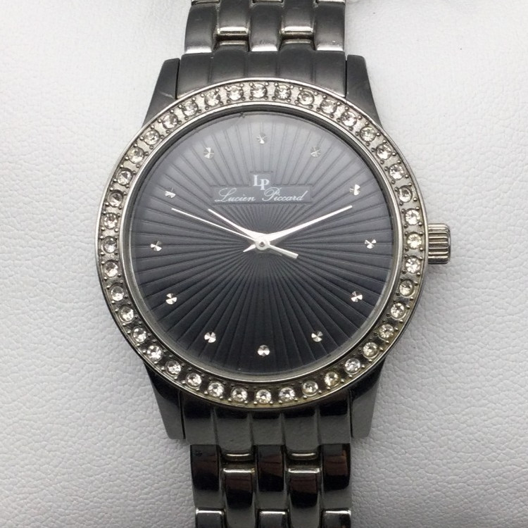 Lucien Piccard Watch Women 31mm Silver Tone Black Starburst New Battery 8.25″
