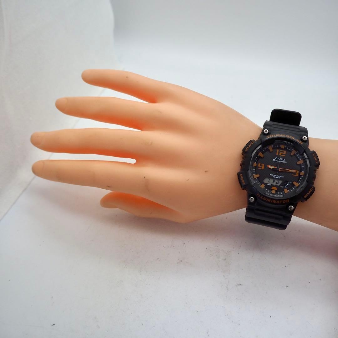 30-year-old working CASIO men’s analog-digital solar watch, black and orange