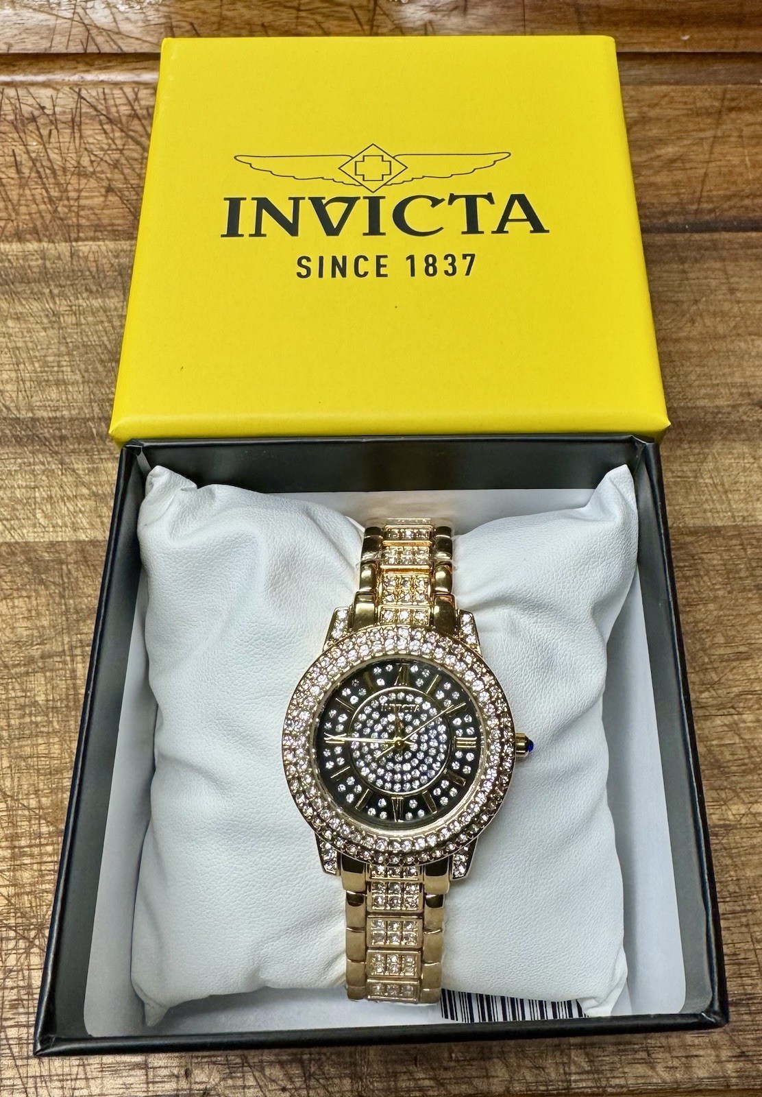 69425 – Invicta Wildflower Women’s Watch – 32mm, Gold Black and Gemstone Dial.