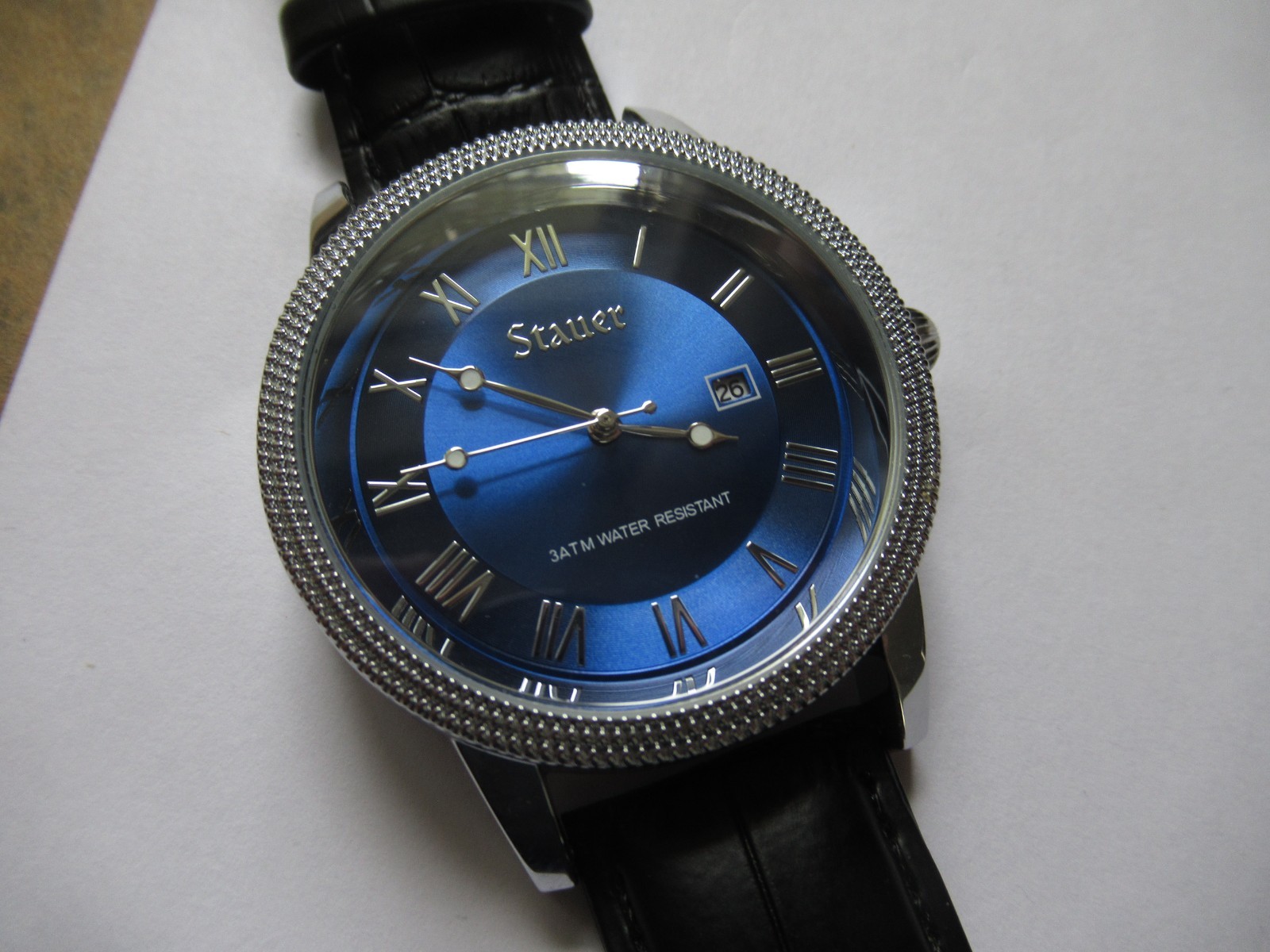 Stauer Urban Blue Men’s Wristwatch Roman Numerals Date Window Embossed Band Runs