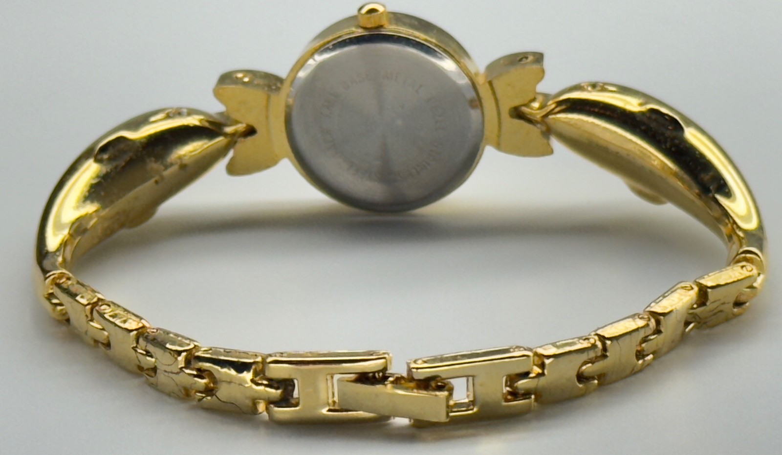 Women’s Collezio Quartz Wristwatch Gold Tone Dolphin Bracelet Analog Linked READ