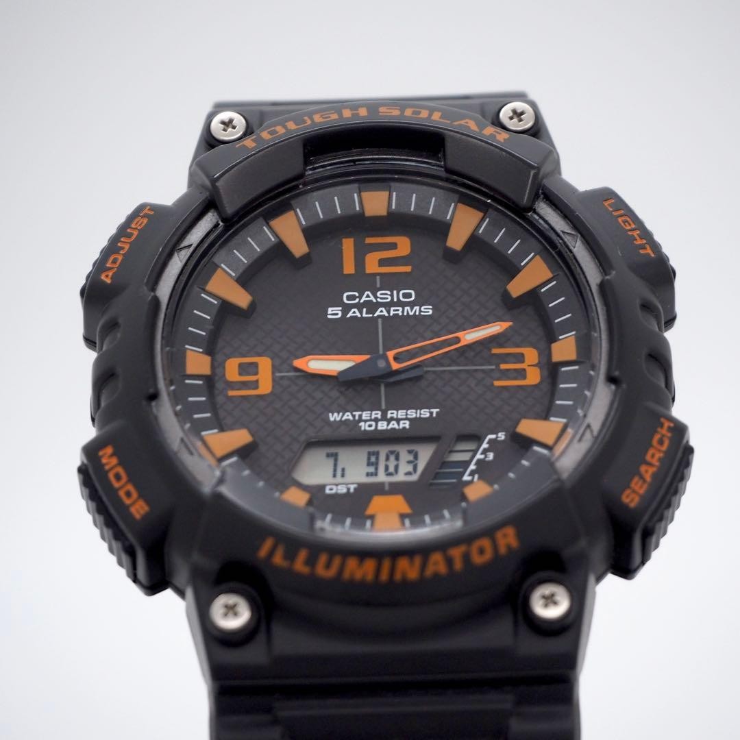 30-year-old working CASIO men’s analog-digital solar watch, black and orange