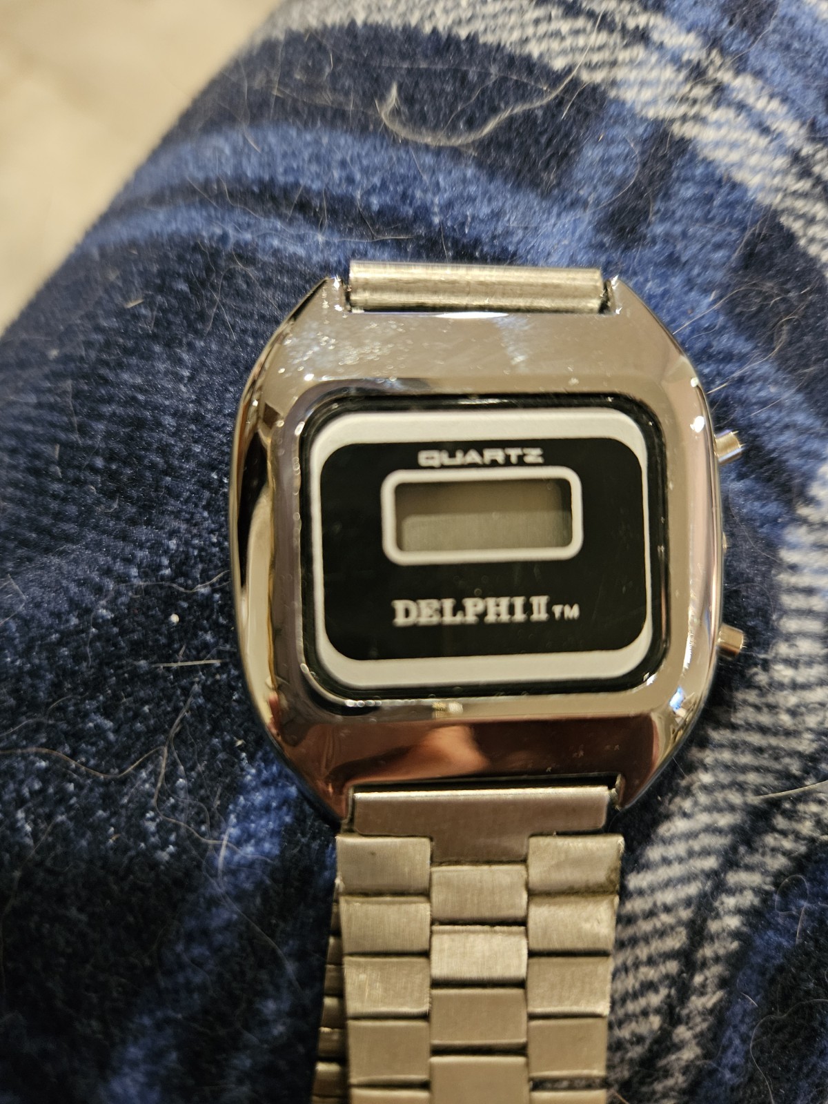Delphi Delphi II Quartz Digital Wristwatch Silver Metal Square Black Dial