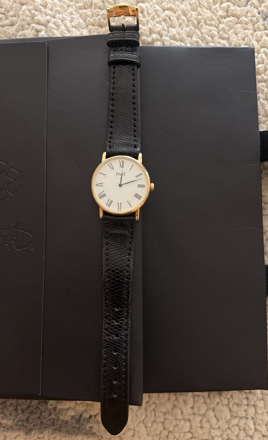 Piaget Model Quartz Dress Watch Gold Case White Dial Roman Numerals Black