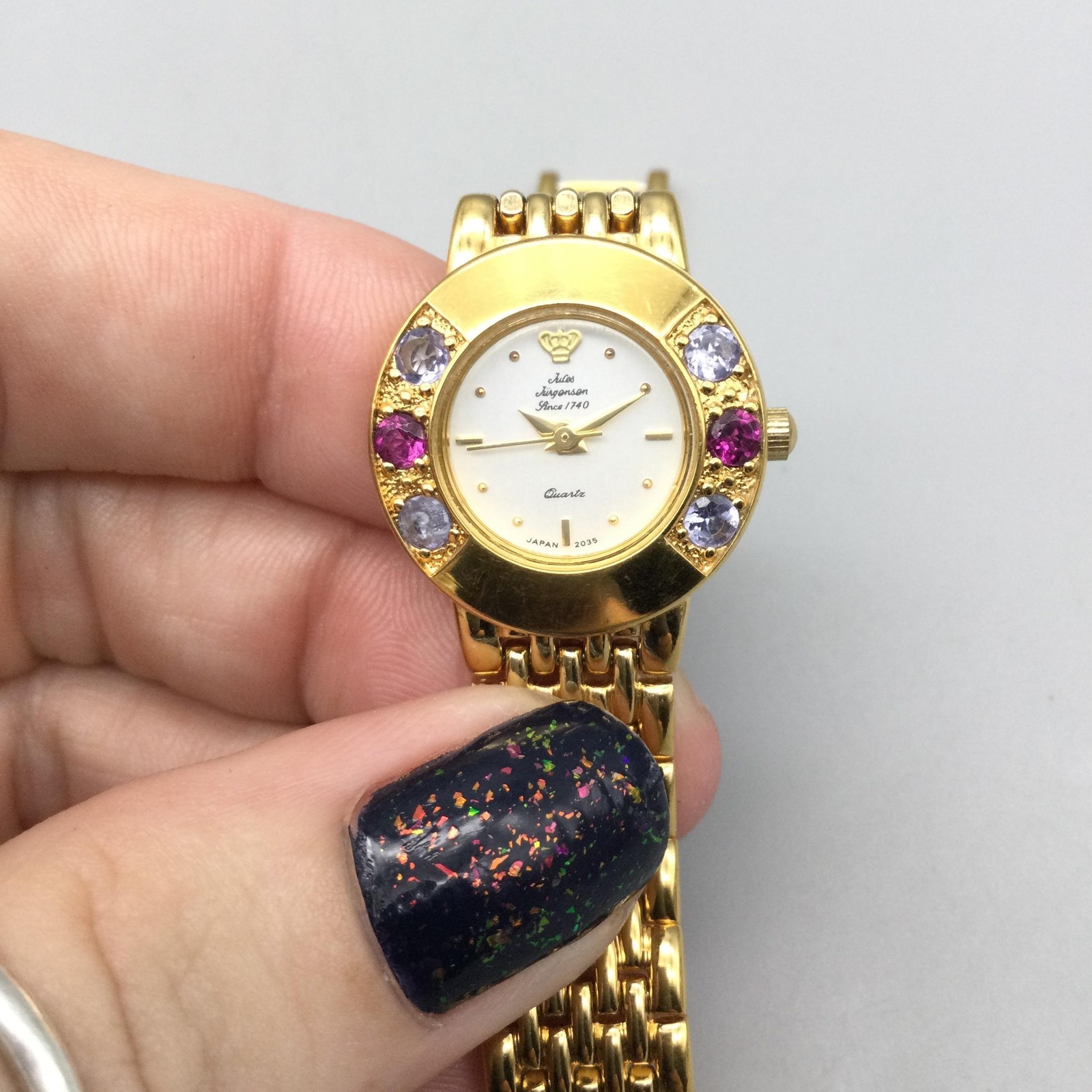 Jules Jurgensen Womens Watch 22mm Gold Tone Red Gemstones New Battery 6.75″