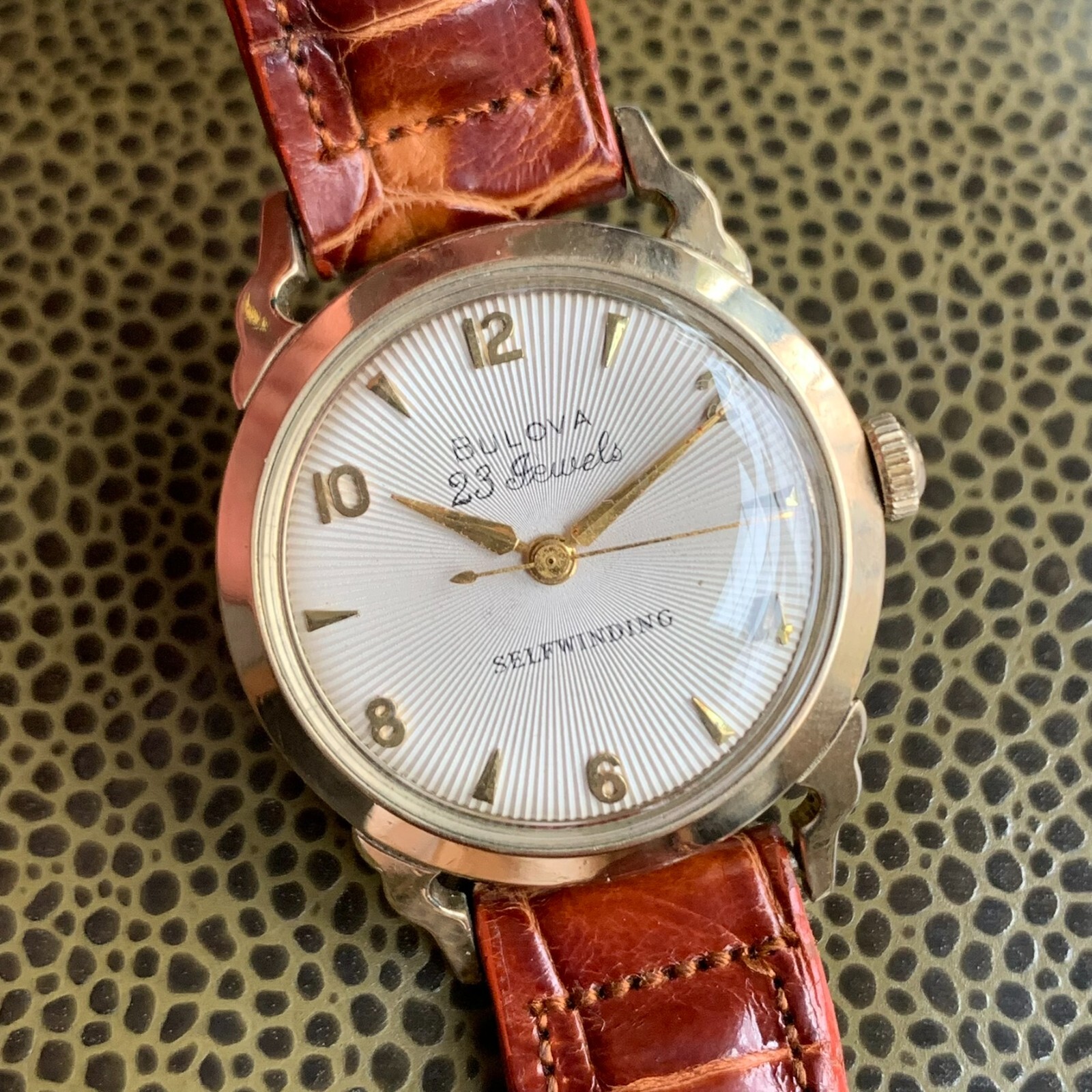 1957 Bulova 23 Jewels 10K Rolled Gold Plated Wristwatch White Sunburst Dial