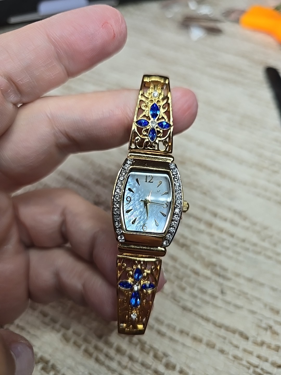 Bradford Exchange Moments of Faith” Ladies Stretch Watch Goldtone Blue MOP Face