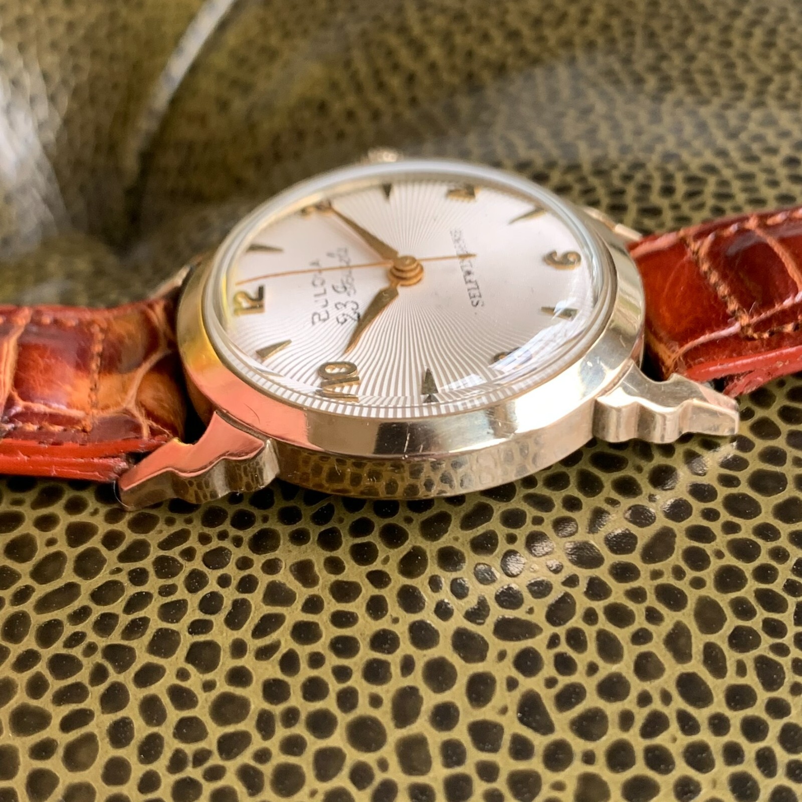 1957 Bulova 23 Jewels 10K Rolled Gold Plated Wristwatch White Sunburst Dial