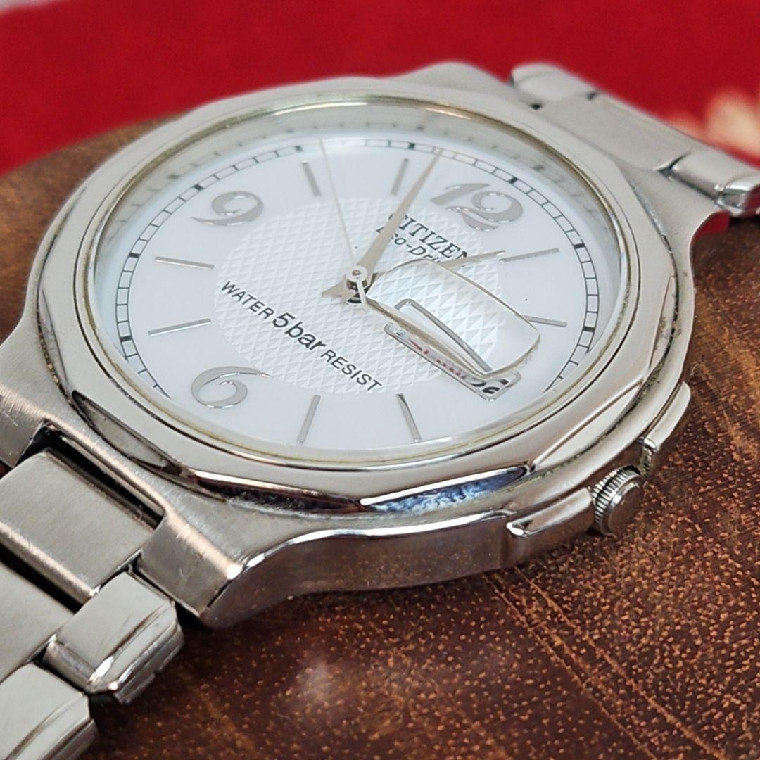 Excellent condition Citizen Eco-Drive watch E100 Day-Date Stainless Steel Workin