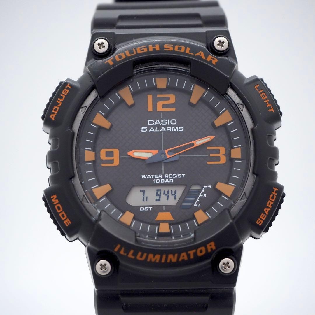 30-year-old working CASIO men’s analog-digital solar watch, black and orange