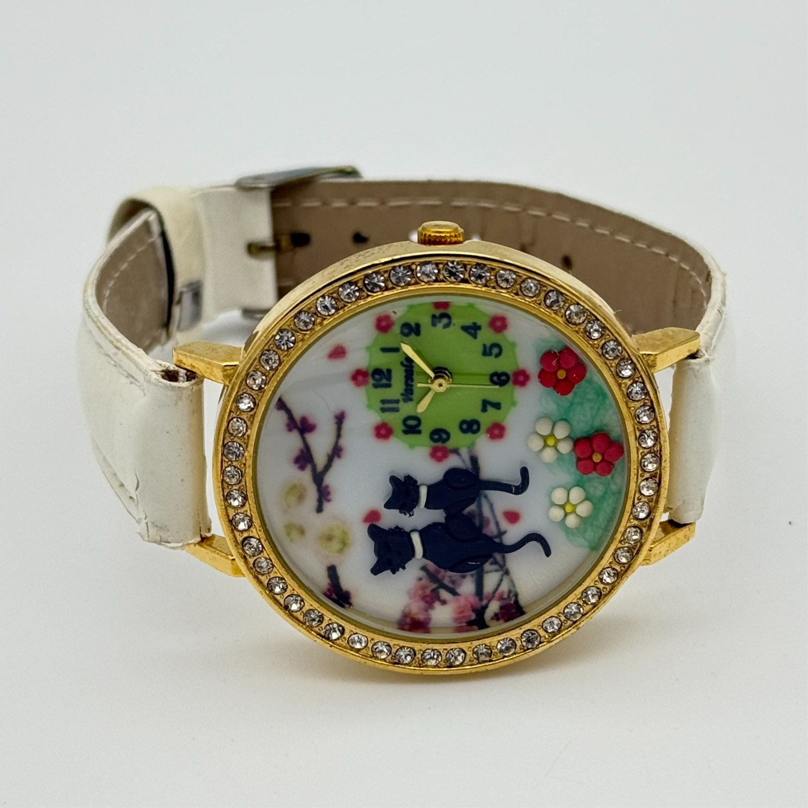 Women’s VERSALES Gold Tone Cat Themed Crystal Accent 40mm Watch, White Band