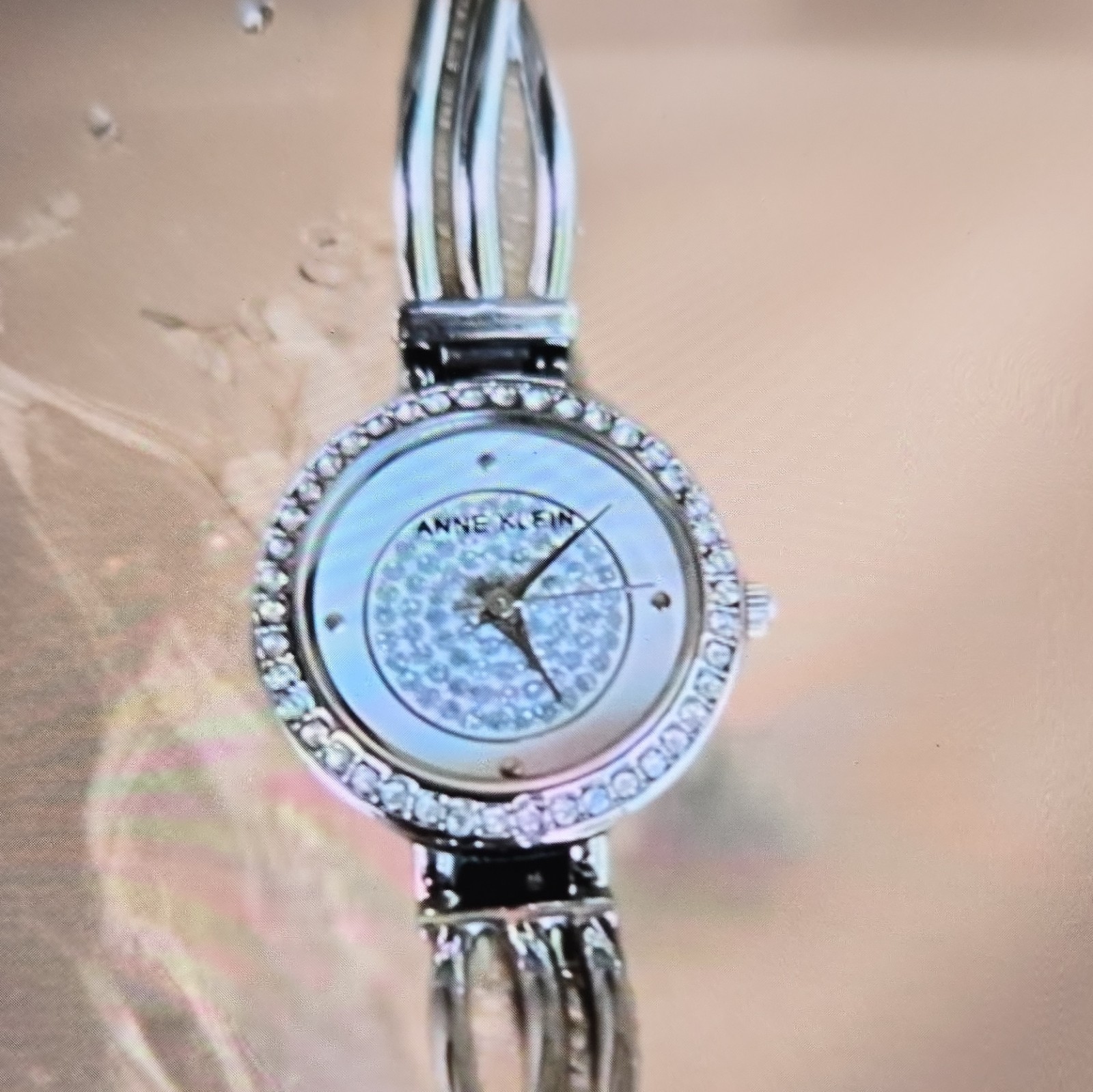 Anne Klein Women’s Quartz Analog Silver Dial Bangle Watch Gem-Set Bezel