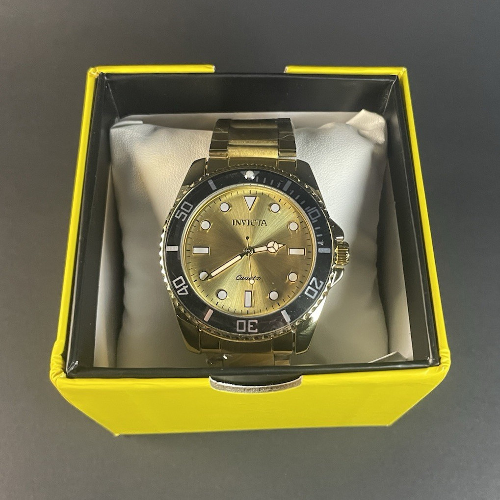 Invicta Pro Diver Men’s Quartz Diver Watch 42mm Gold Tone Black Bezel, 69396