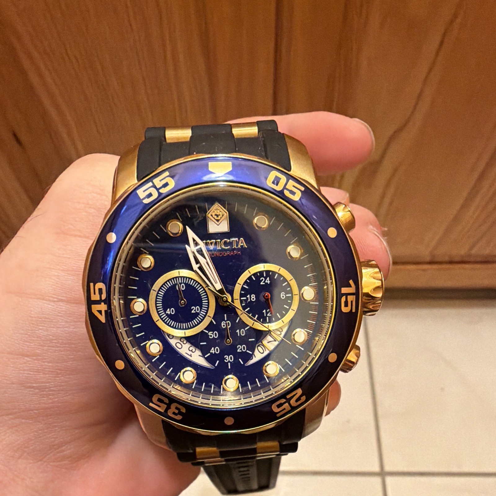 Invicta Chronograph Men’s Quartz Blue/Gold Dial Gold Case Black Strap