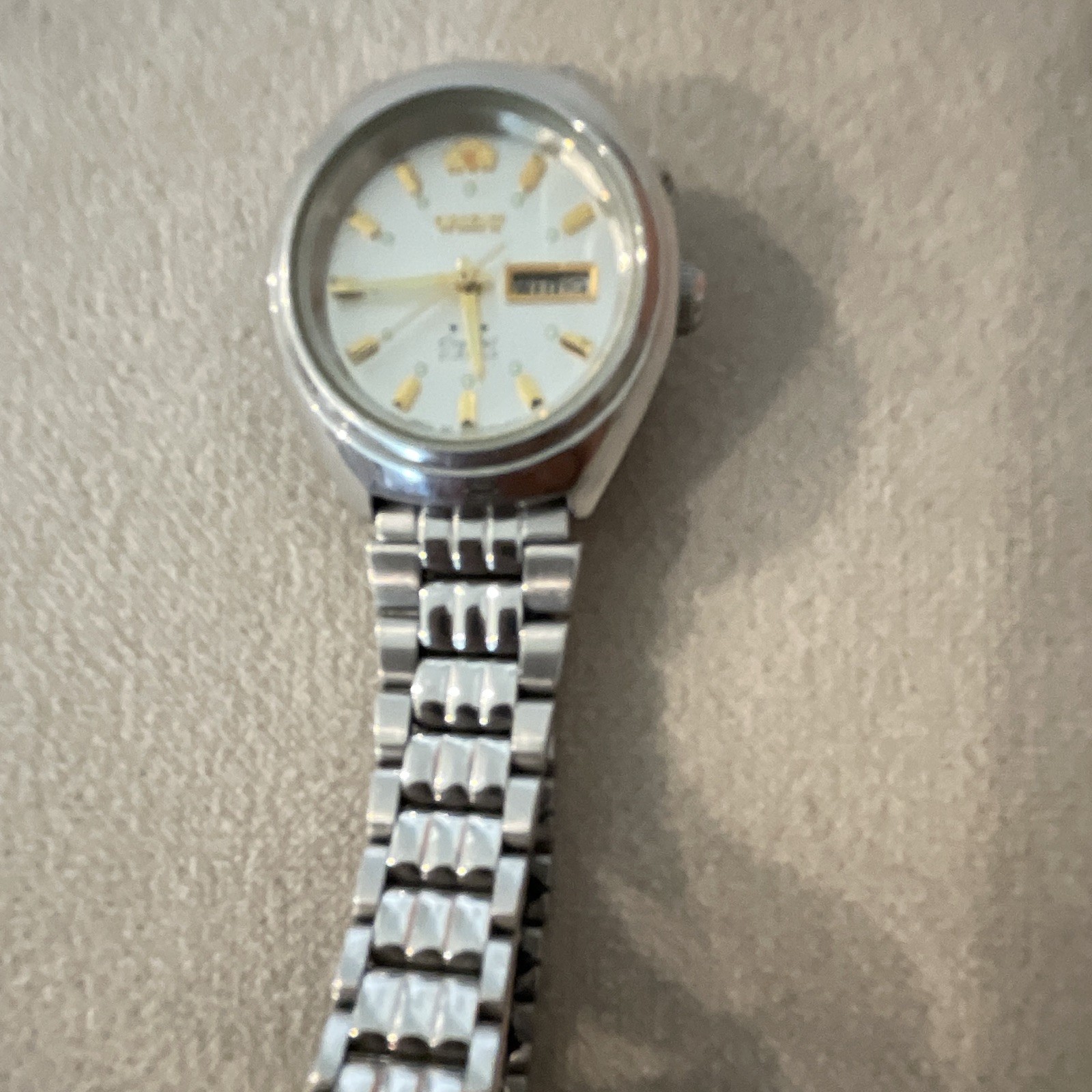 Orient 5 Men’s Automatic Analog Day/Date White Dial Silver Bracelet Watch