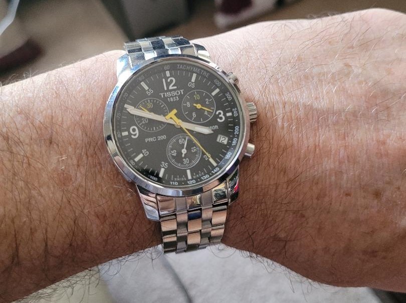 mens Tissot watch, brand new condition, includes extra links.