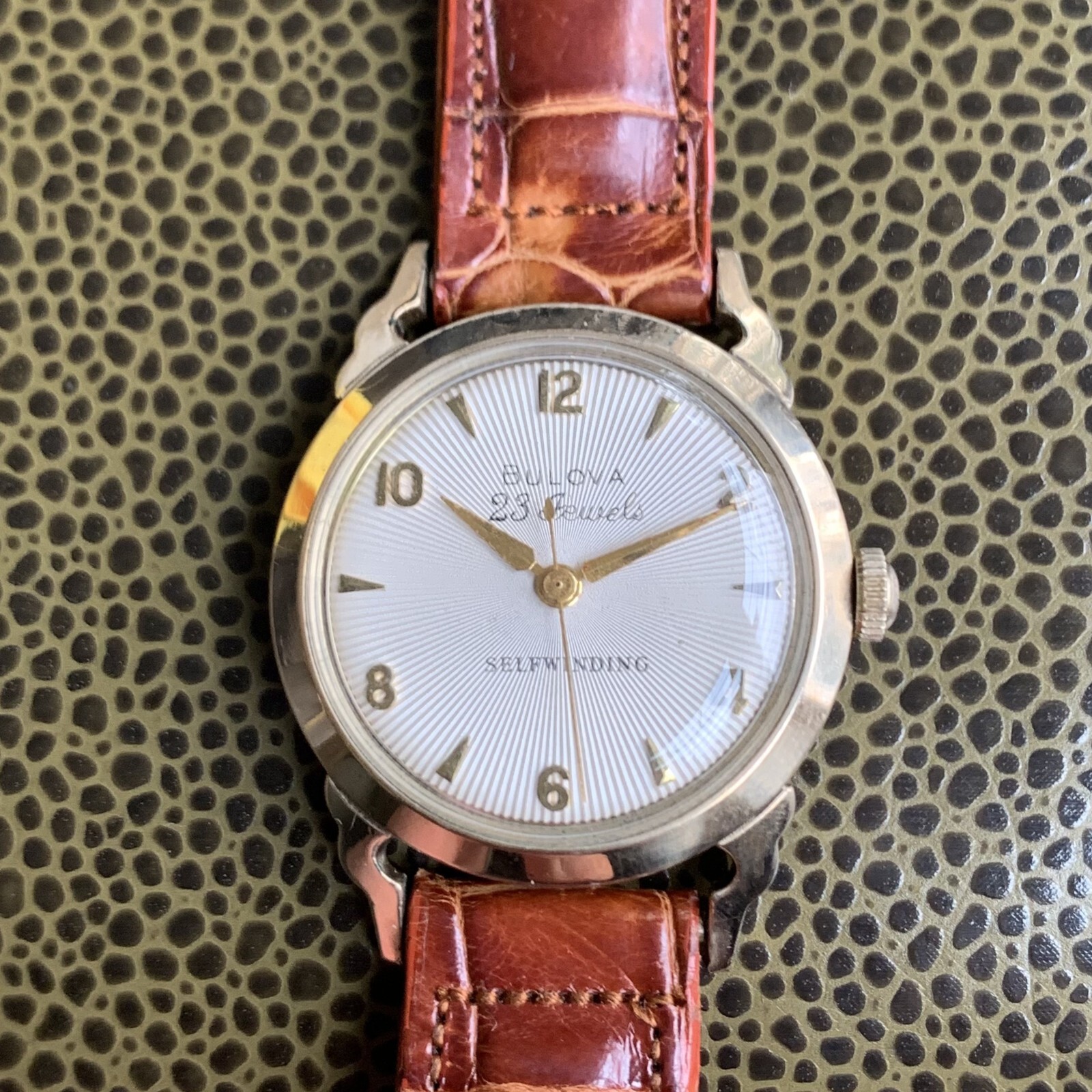 1957 Bulova 23 Jewels 10K Rolled Gold Plated Wristwatch White Sunburst Dial