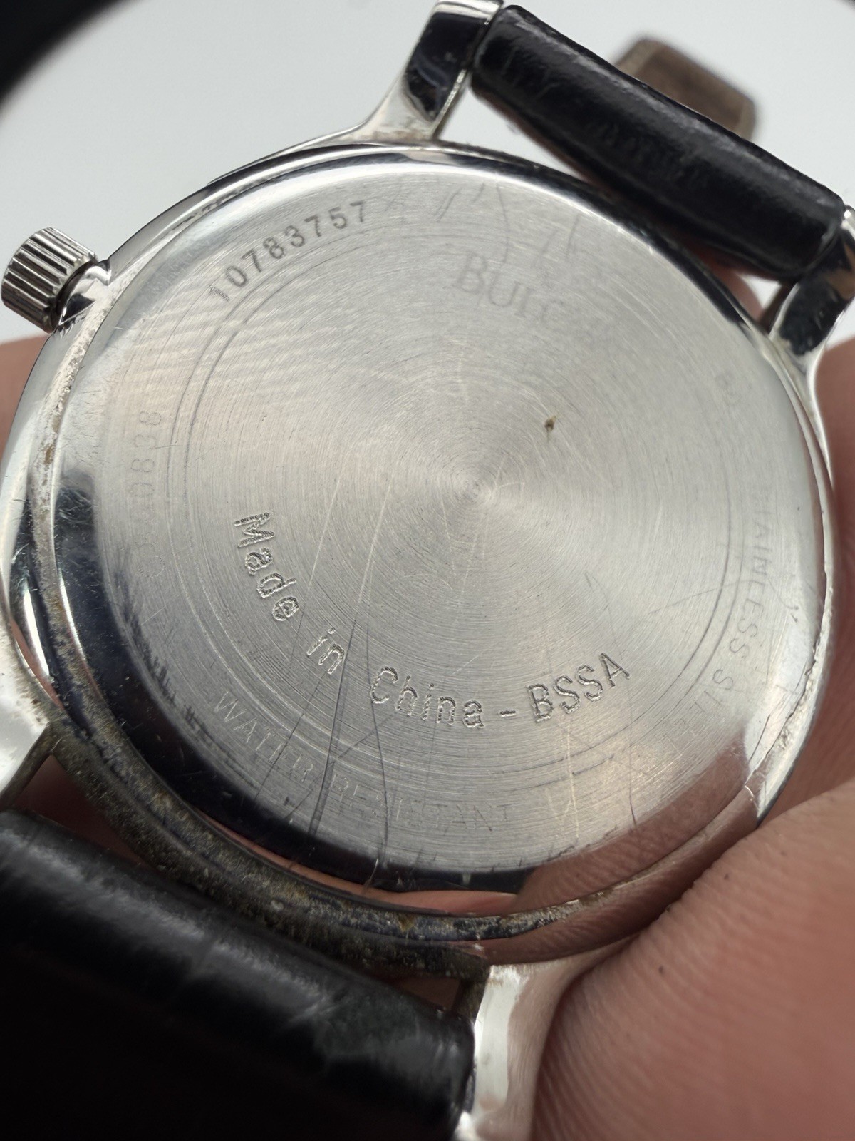 Bulova Metro Men’s Analog Watch Silver Dial Black Leather Band No Date