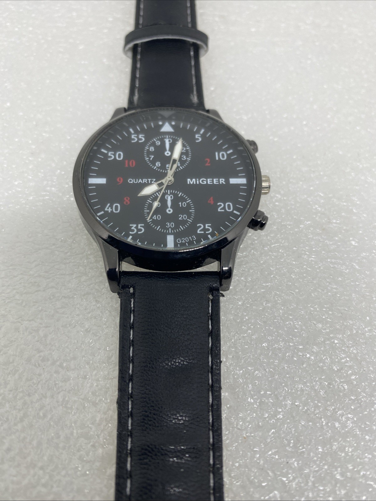 Men’s Migeer Wuartz Wristwatch Black Leather Band. Needs New Battery