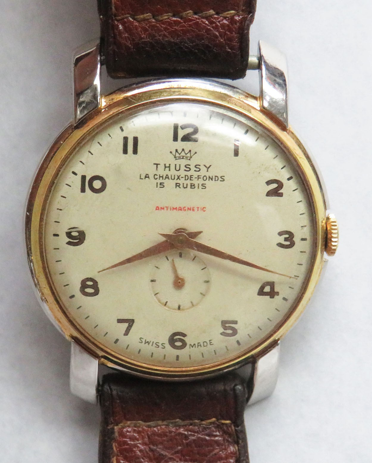 1960’s THUSSY GOLD ON SS OVERSIZE 38mm WRISTWATCH w VINTAGE STITCHED STRAP