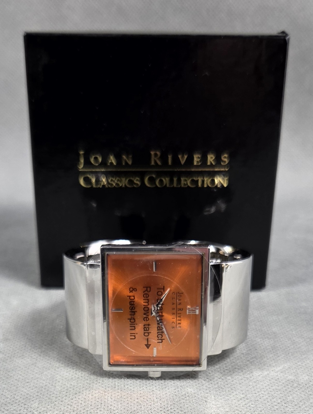 JOAN RIVERS Classic Collection ORANGE Quartz CUFF Silvertone WATCH #V377
