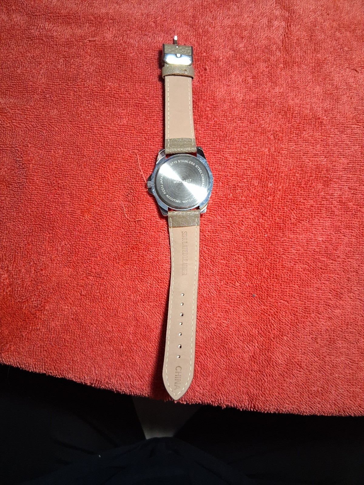 Accutime Analog Wristwatch with a Buckle Band