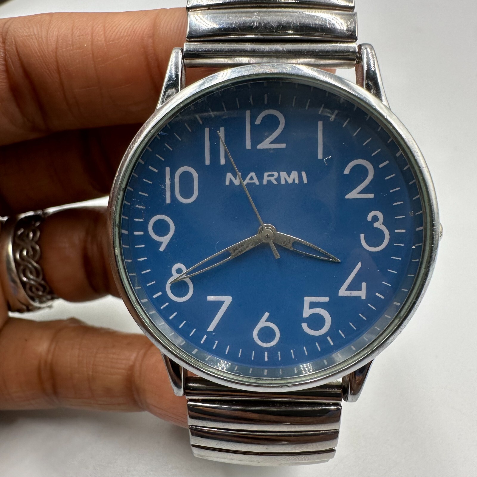 Narmi Watch Women Silver Tone Blue Dial Large Numberals Stretch Band New Battery