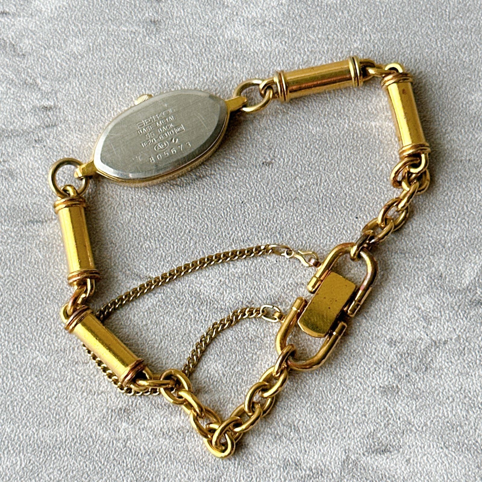 SEIKO 1E20 6310 Ladies Bangle Watch Rare Gold Color Quartz Vintage Bracelet Watc