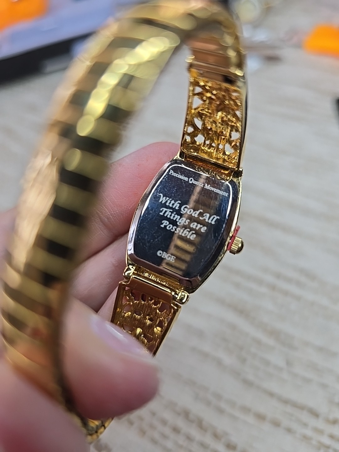Bradford Exchange Moments of Faith” Ladies Stretch Watch Goldtone Blue MOP Face