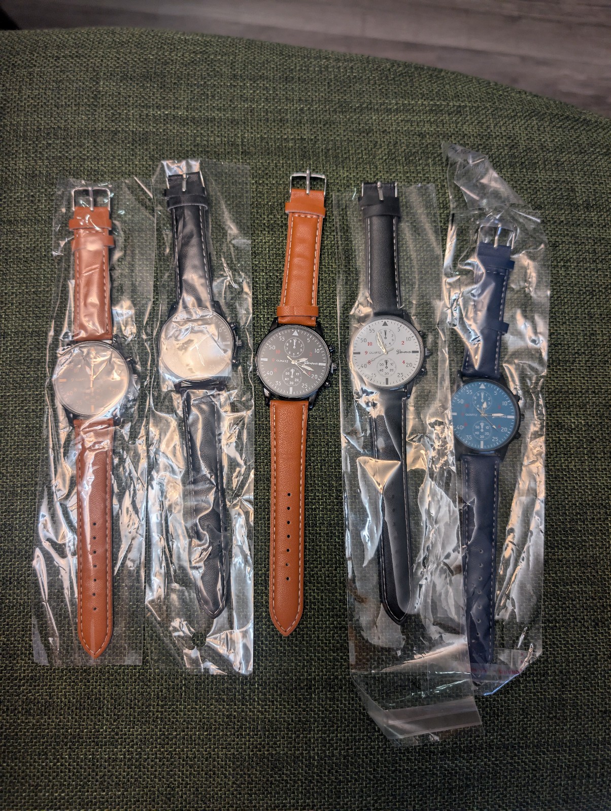 wholesale lot of 5 mens watches mixed colors.