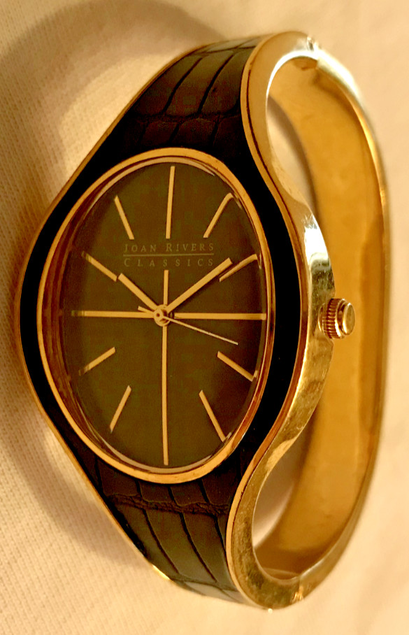 Joan rivers bracelet watch womens runs very good condition oval black gold