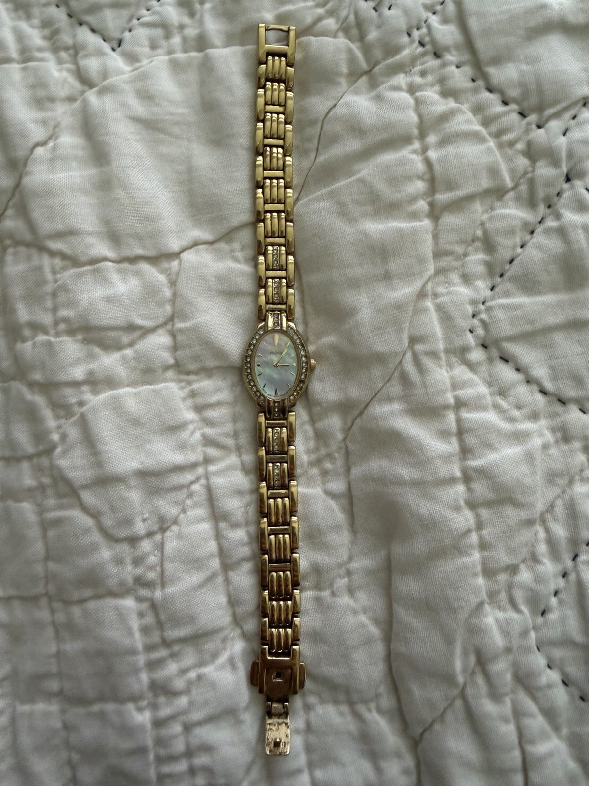 Citizen Eco-Drive Women’s Gold Tone Oval MOP Dial Gem-Set Bezel Bracelet