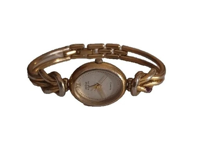 *Anne Klein Women’s Wrist Watch Roman Numeral Noon Gold tone (no backing)(5236)