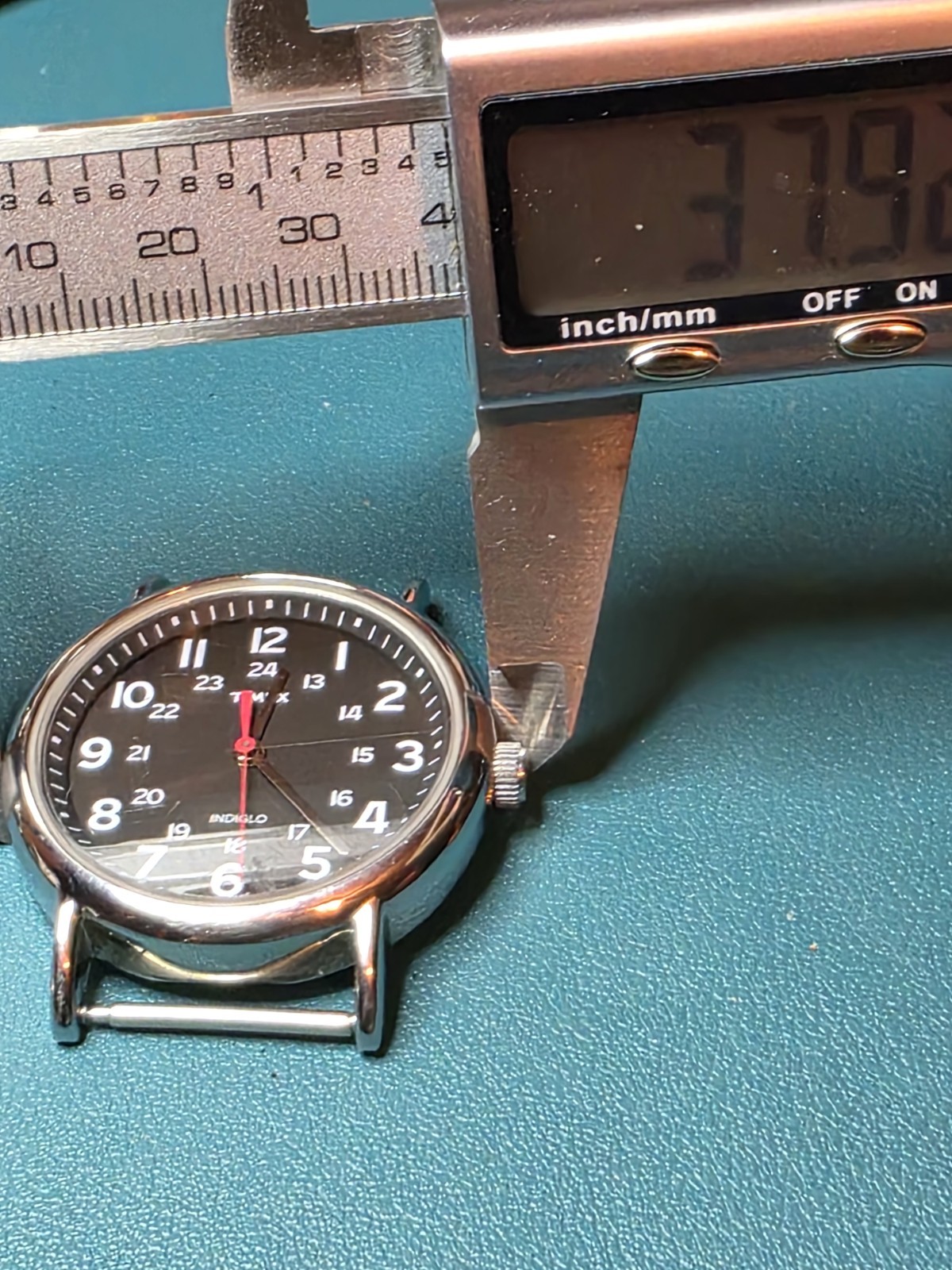 Timex Men’s Indiglo 24 hour military used watch. Has some scratches.
