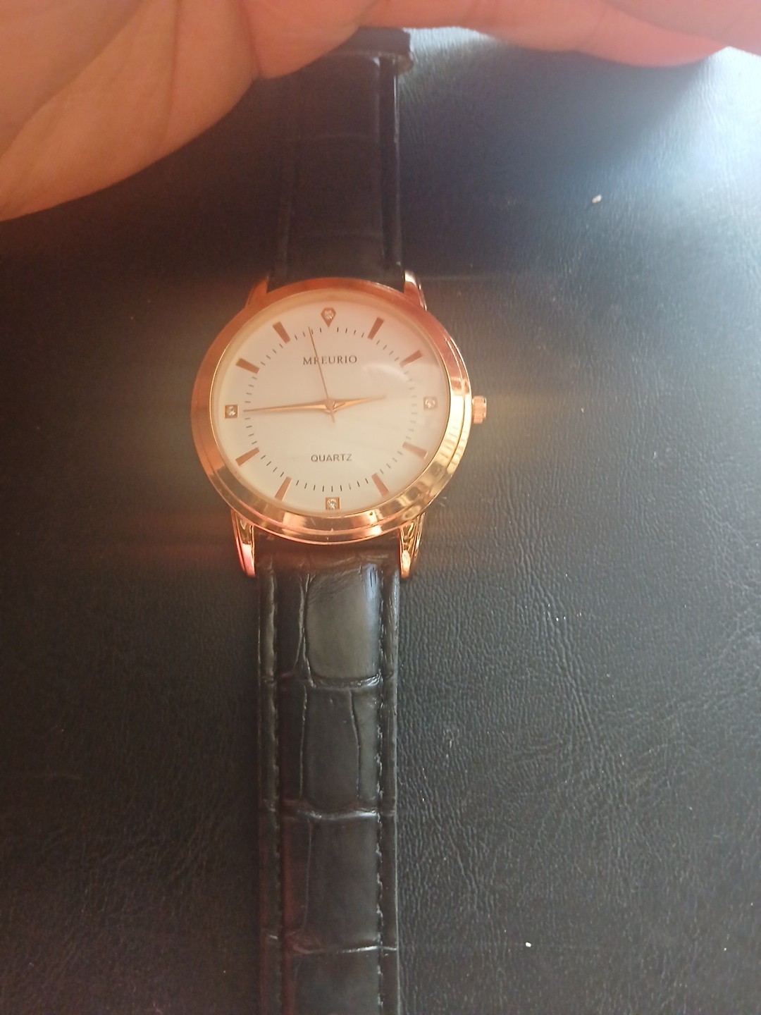 Mreurio White Dial Round Gold Tone Case Black Leather Band Watch
