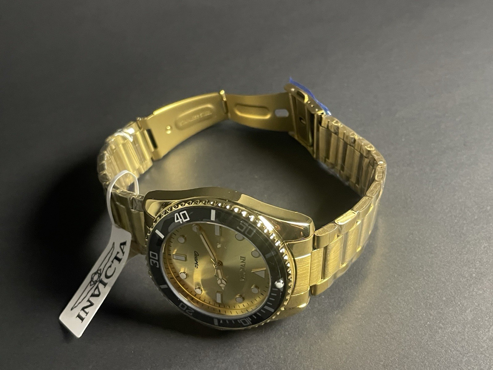Invicta Pro Diver Men’s Quartz Diver Watch 42mm Gold Tone Black Bezel, 69396