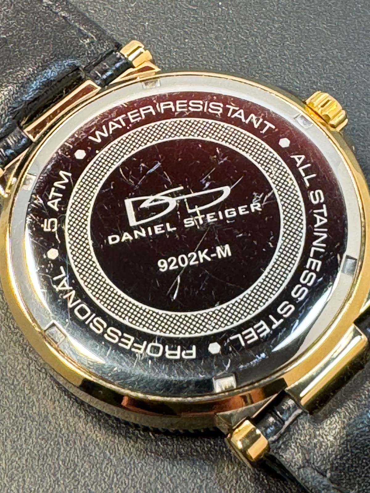 Daniel Steiger Professional Two-Tone Black Bezel Carbon Fiber Dial Watch 9202K-M