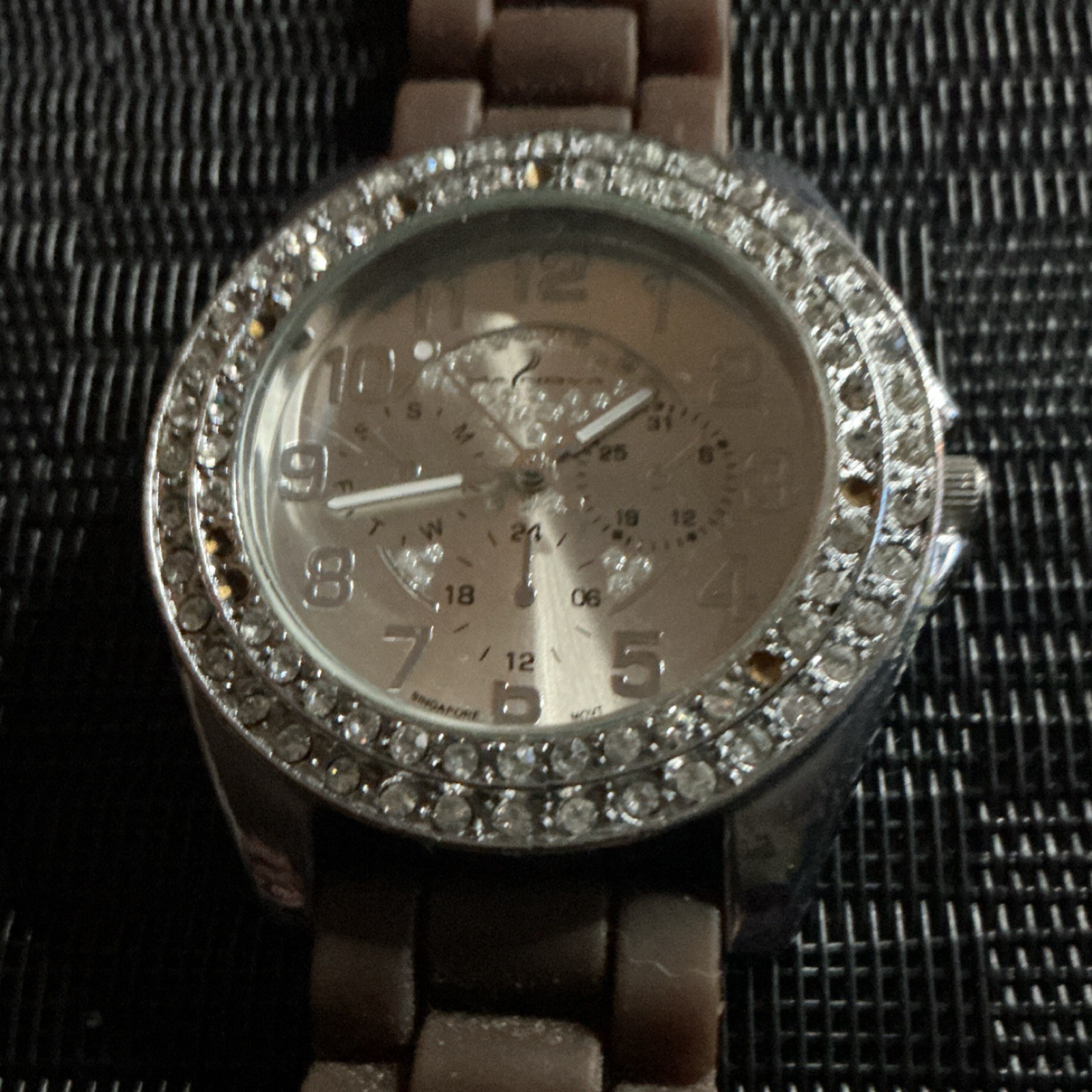 Women’s Quartz Analog Wristwatch Silver Dial Gem-Set Bezel Brown Plastic Band