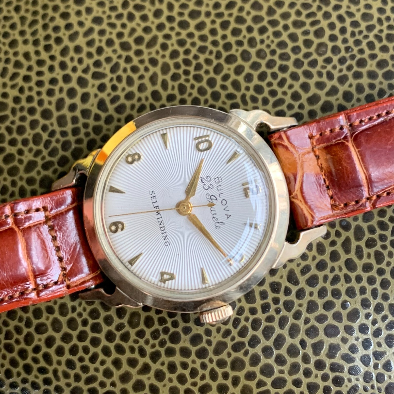 1957 Bulova 23 Jewels 10K Rolled Gold Plated Wristwatch White Sunburst Dial
