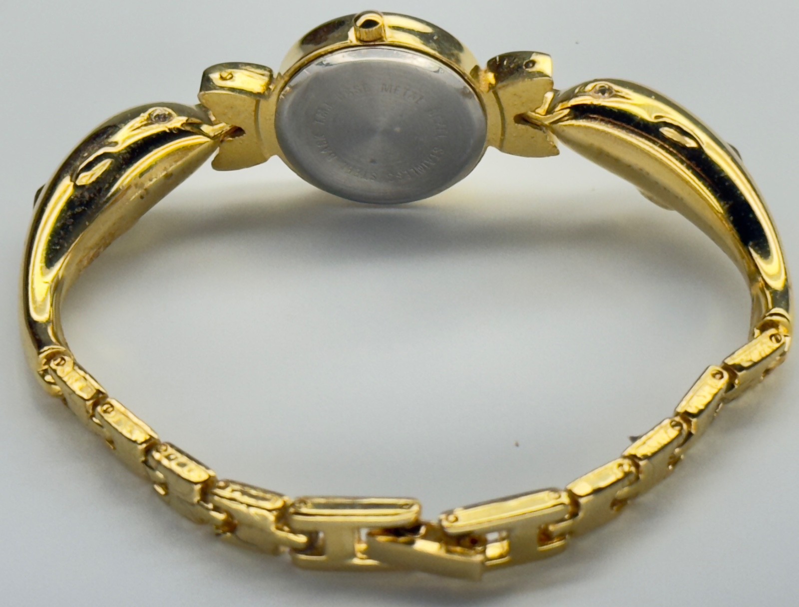 Women’s Collezio Quartz Wristwatch Gold Tone Dolphin Bracelet Analog Linked READ