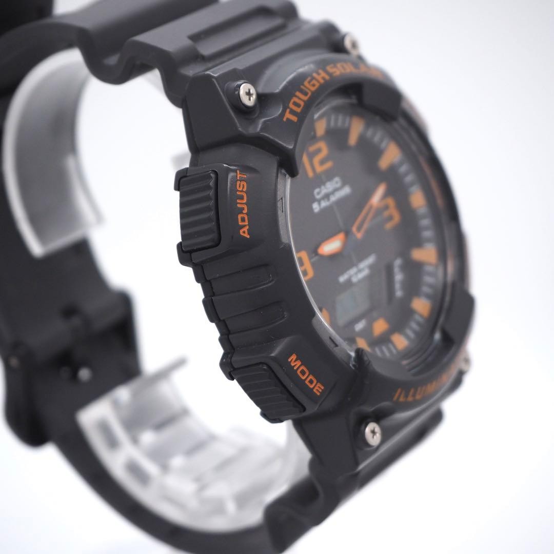 30-year-old working CASIO men’s analog-digital solar watch, black and orange
