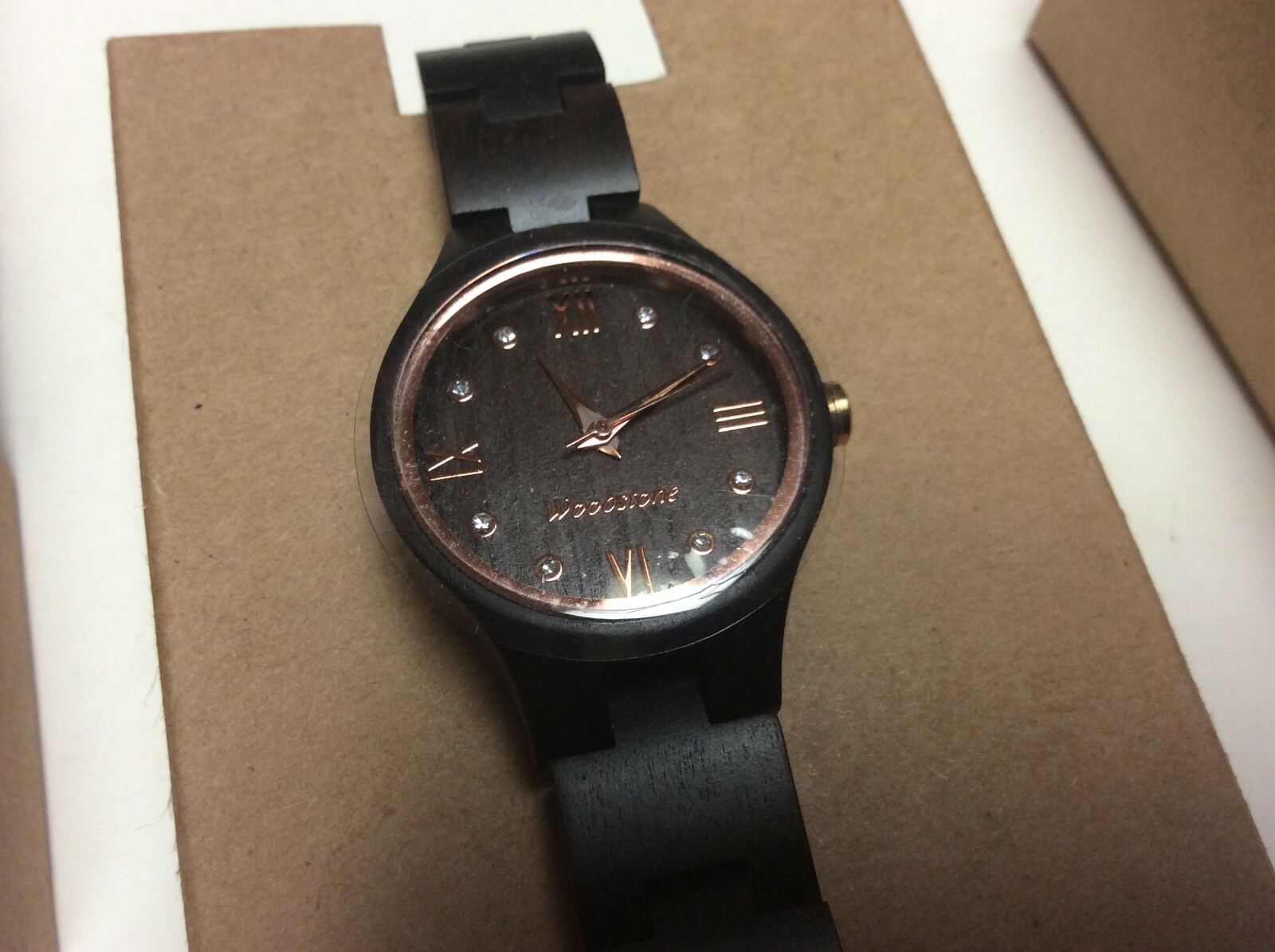 NOS Woodstone womens watch, black sandalwood case & band,w/box & papers-L1200