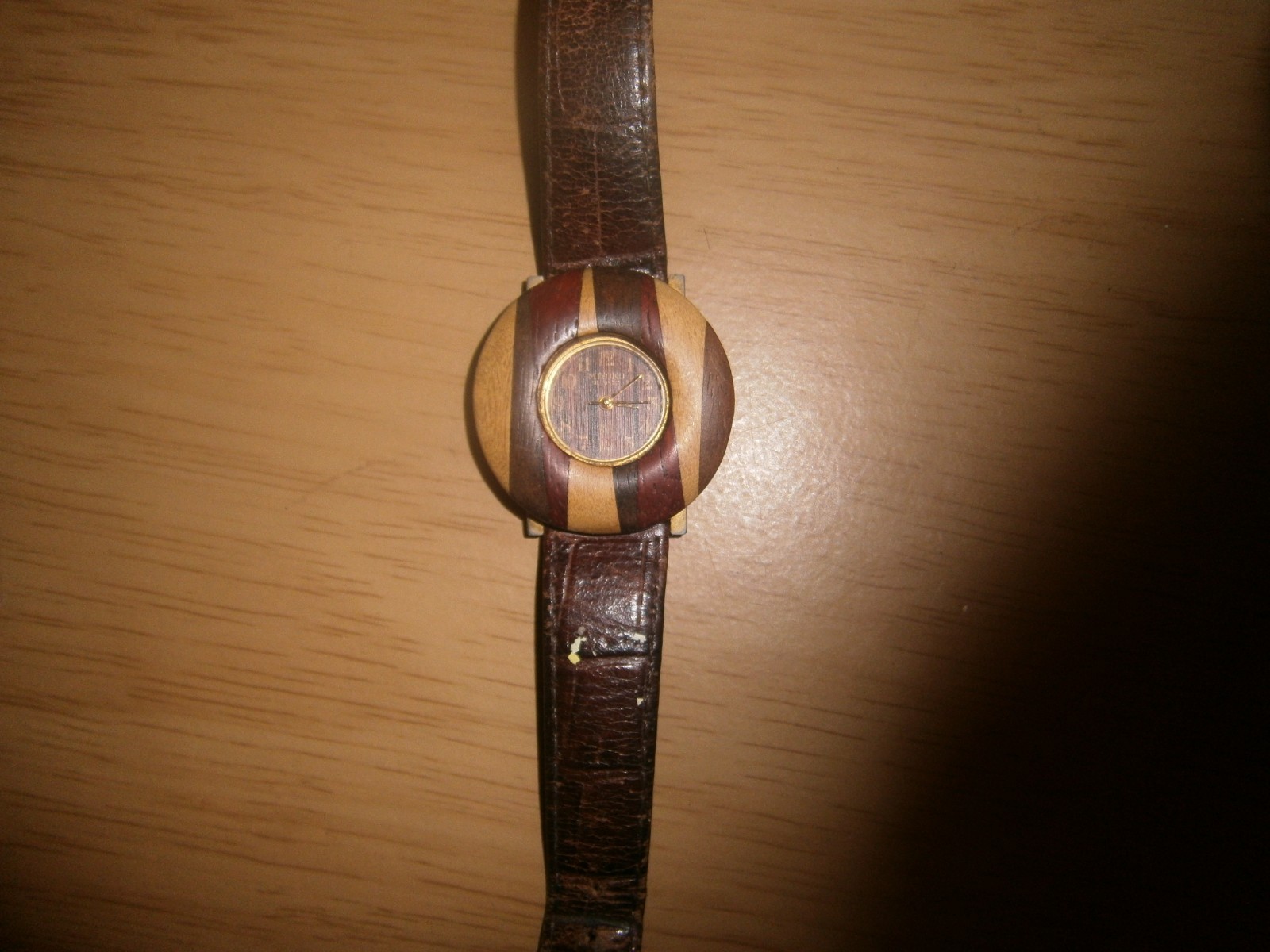 Brown leather strap Miyoko quartz watch.Wood bezel. 23cm. (E22a3)