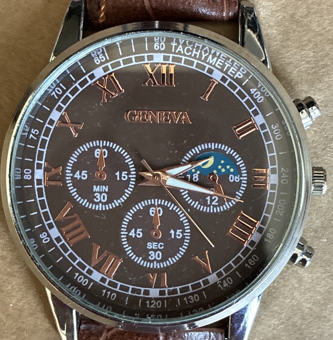 ￼ Geneva Men’s Classic Quartz Watch – Brown Dial, Roman Numerals, Unworn/Working