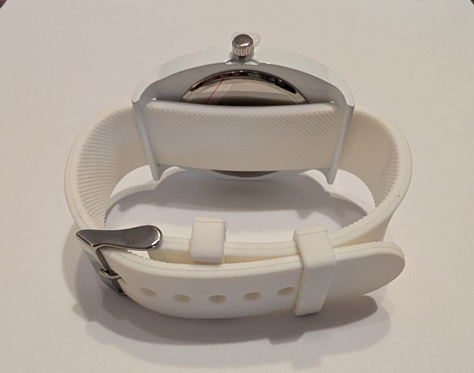 Xhilaration watch with 3 interchangeable straps: white, pink, green. MSRP $19.99