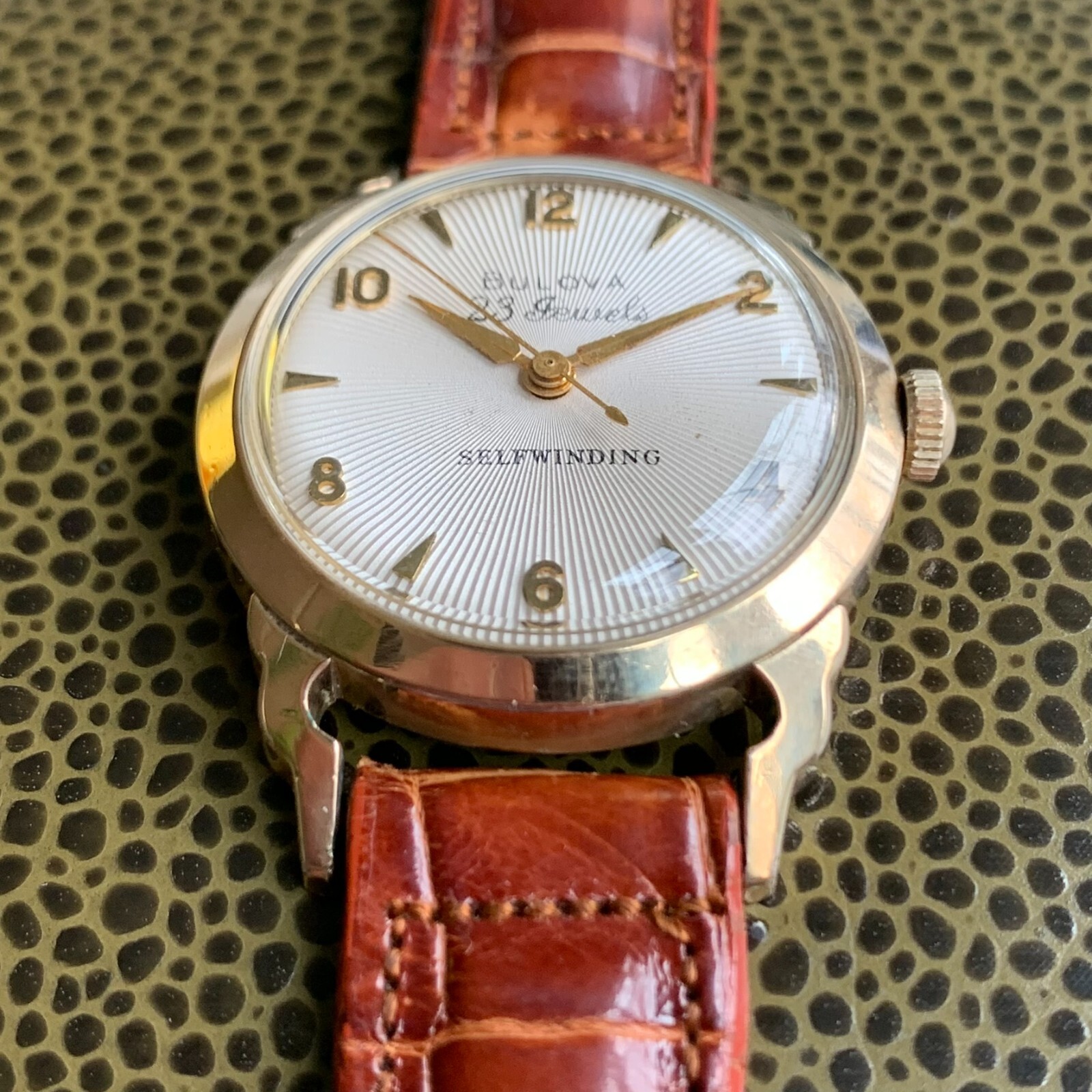 1957 Bulova 23 Jewels 10K Rolled Gold Plated Wristwatch White Sunburst Dial