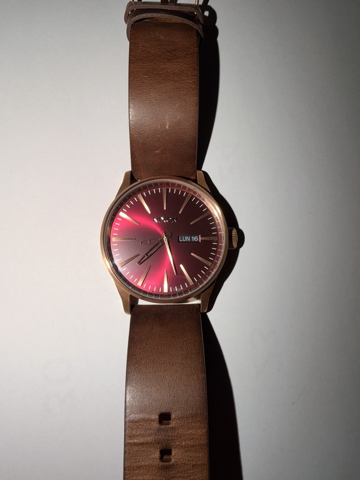 Nixon Sentry Quartz Wristwatch Red Dial Day/Date Gold Case Brown Leather Box
