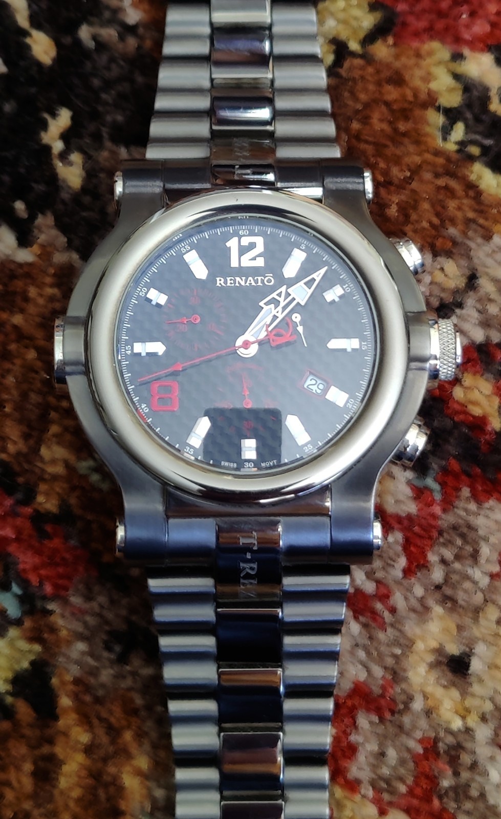 VIDEO Renato T-Rex mens watch. Titanium color, band and a carbon fiber look dial