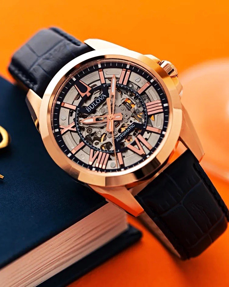 Bulova Sutton Men’s Automatic Skeleton Dial Rose Gold Blue Leather Watch 43mm