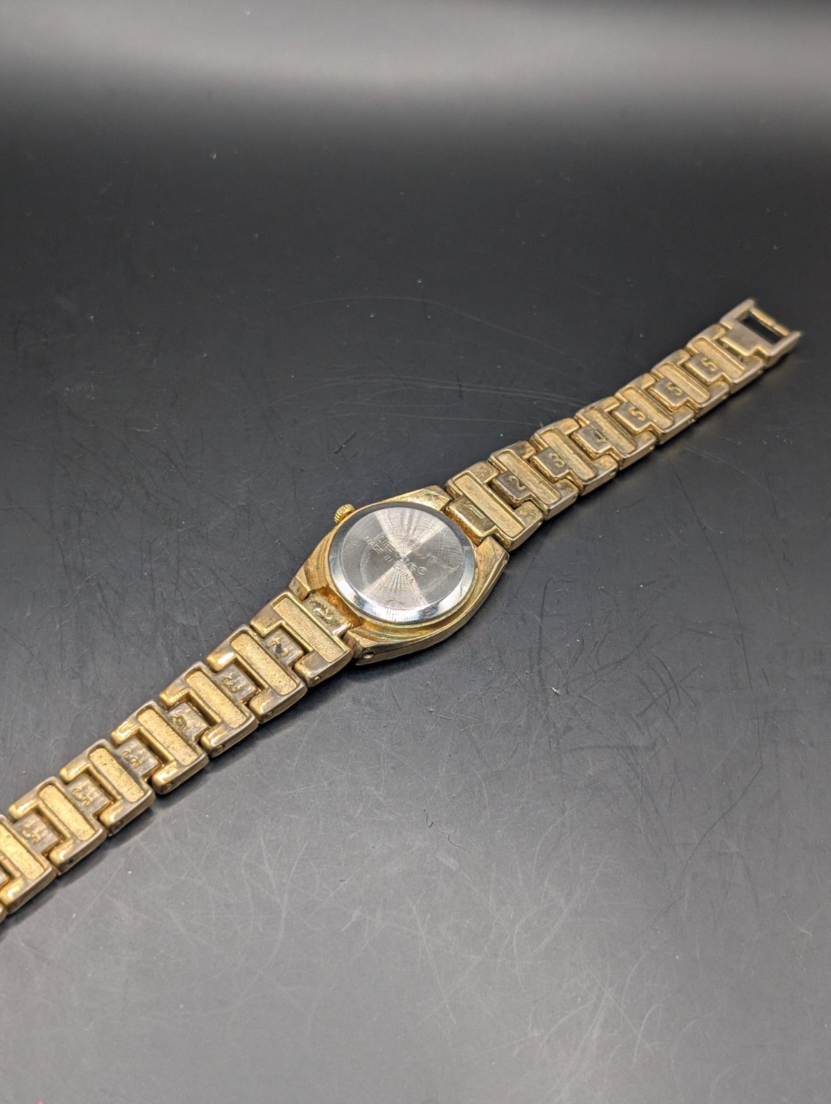 VTG Life Long Womens Watch Gold Tone Nugget Style Black Dial New Battery